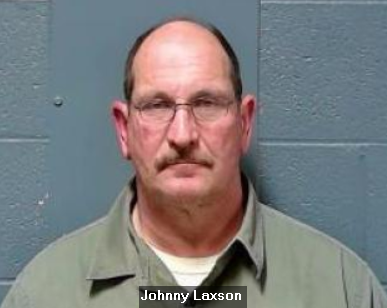 Booking photo of Johnny Laxson.